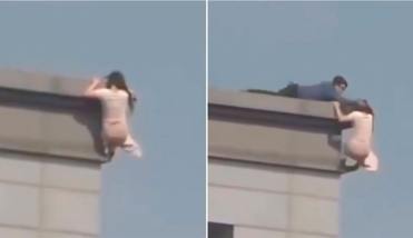Video: un policía salvó a una joven al borde del vacío en un piso 19